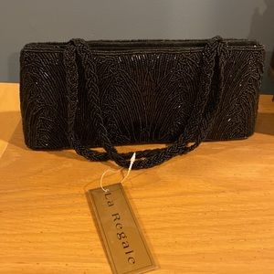 New- small black beaded purse with 2 beaded straps. 9.5x4x1.75inches
